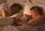 Mother and father sleeping in bed with baby / Alamy Images / Posed by Models